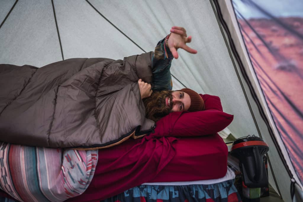 Camp bed - Man in Tent